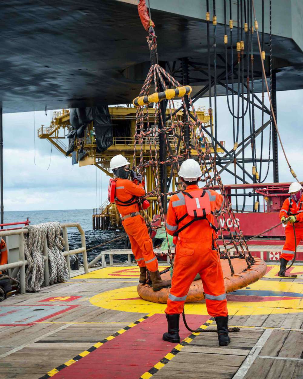 Personal basket tranfer form  supply boat to oil&gas rig offshore during crew change by boat.