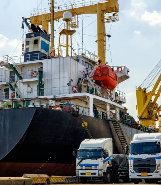 export-container-ship-with-cranes-loading-goods-on-2023-11-27-05-14-26-utc copy